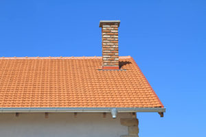 masonry chimney with blue sky