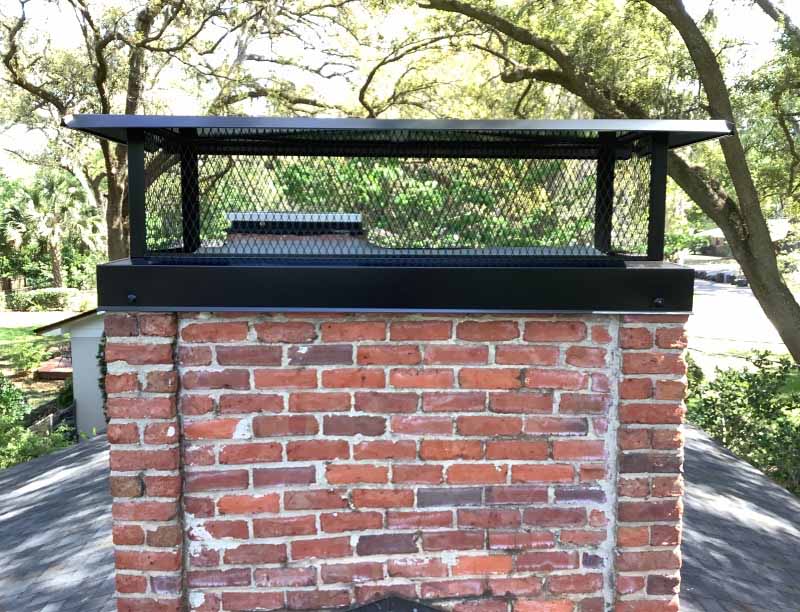 Masonry chimney with custom outside mount cap and top damper
